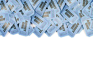 Blue admit one movie or theater cinema ticket lots several scattered top border background white copy space photo