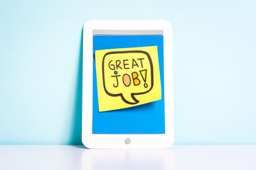 Great job / Well done. Post-it note with a motivational message.