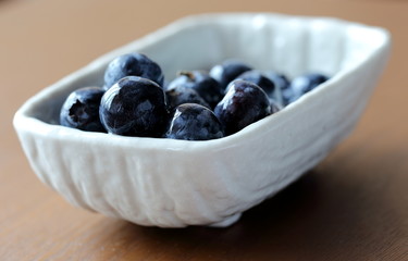 Blue Berries Being Served in Small Bowl