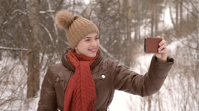 Girl taking a selfie with a big smile