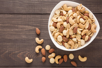 Almond, macadamia, peanut, cashew are in a blow