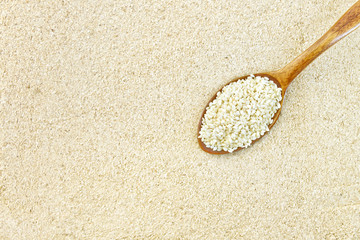 Flour sesame with seeds in spoon