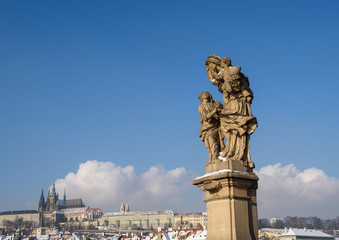 Fototapeta na wymiar Sculptures in Prague on the Charles Bridge