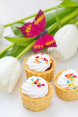 Delicious cupcakes  with spring tulips