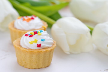 Delicious cupcakes  with spring tulips