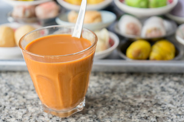 Thai hot tea breakfast in south Thailand with dimsum background 