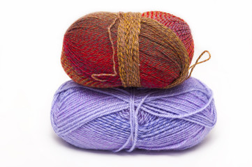 colored melange/Close-up of two balls of yarn for knitting , melange, lying on each other