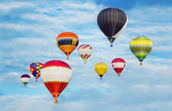 Hot Air Balloons In Cloudy Blue Sky