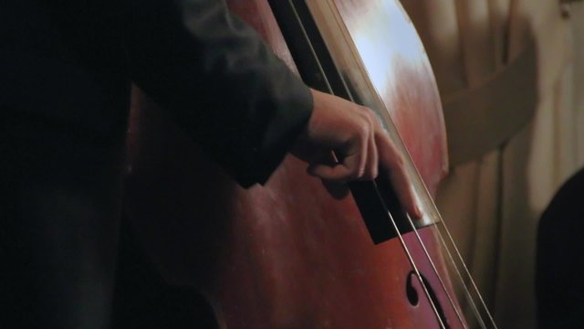 Jazz guitar trio playing on stage 