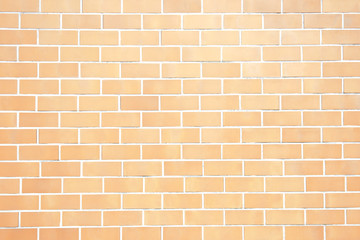 Orange yellow new brick wall perfectly background. Best clean brick wall. Sweet and cute. Close up. Front view.