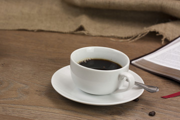 Coffee cup against a rustic background