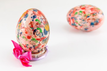 Painted Easter egg in custom egg holder