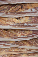 Piece of smoked meat , in tradition fair of Vilnius.