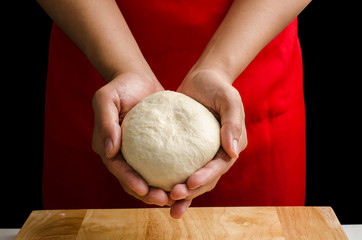 Bread dough hold by hand,bread cooking