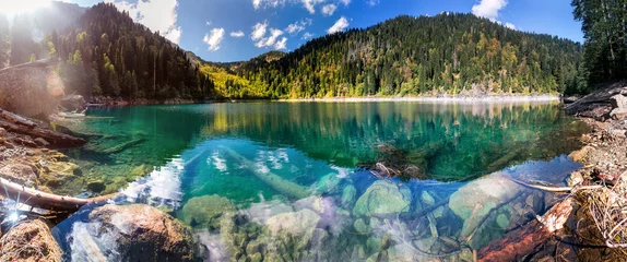  Beautiful panoramic view of Small Ritsa mountain lake in Ritsa National Park on a sunny summer day, Abkhazia © EdNurg