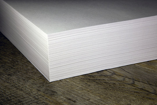 a stack of white paper for the printer