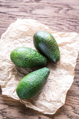 Avocado on the wooden background