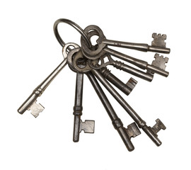 Old rusty keys isolated on white.