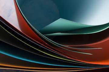Abstract background.  Colorful curved sheets of paper.  Close-up shot