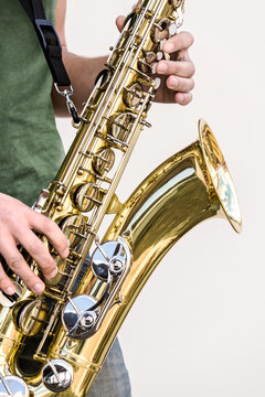 saxophone in the hands of street musician