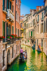 Traditional Gondola on canal in Venice, Italy