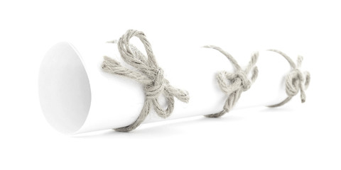 White letter roll tied with rope, three natural nodes isolated