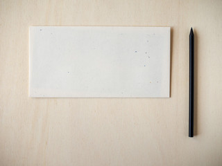 Letter envelope with pencil