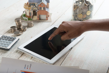 finance concept photo with coins and computer