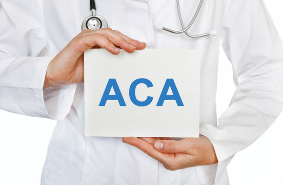 Doctor holding a card with ACA, medical concept