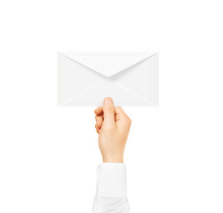 Fototapeta premium White blank envelope mock up holding in hand. 