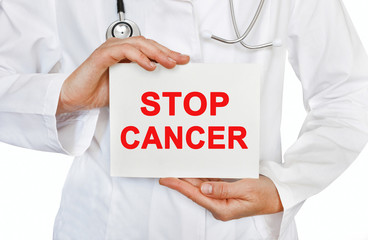 Doctor holding a card with Stop Cancer, Medical concept