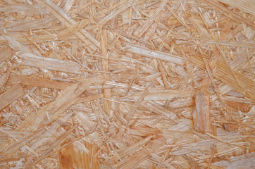 wood texture in the background, OSB boards