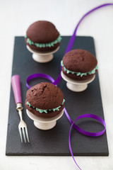 Chocolate whoopie pies with turquoise buttercream filling