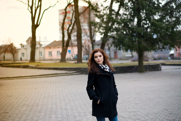 Beautiful girl in the autumn park