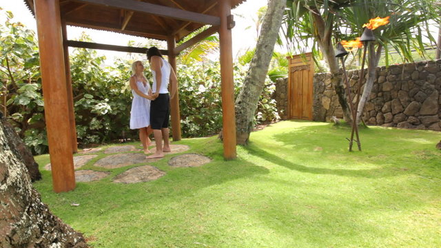 Couple in hut at tropical resort