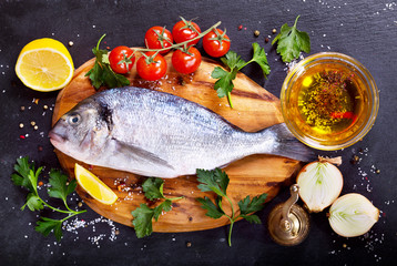 fresh fish dorado with vegetables
