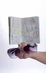 Passport showing immigration entry and departure stamps