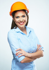 Smiling woman architect standing against white background