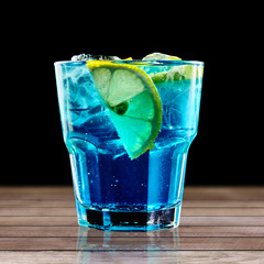 Colourful cocktail on the black background