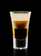 Colourful cocktail on the black background