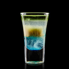 Colourful cocktail on the black background