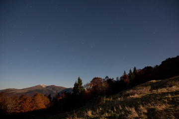 Obraz na płótnie Canvas Starry sky above autumn Carpathians.