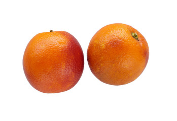 Single colorful red sicilian orange isolated on white