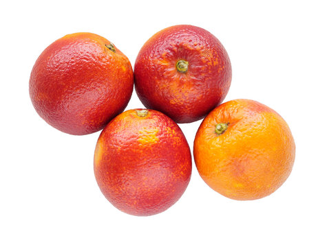 Bunch of colorful sicilian oranges isolated on white