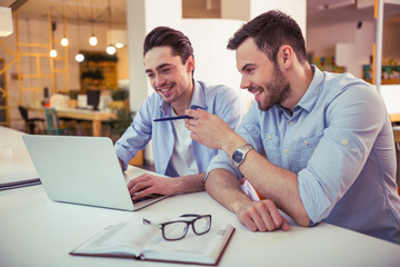 Obraz premium Handsome men working