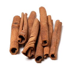 Cinnamon sticks on white