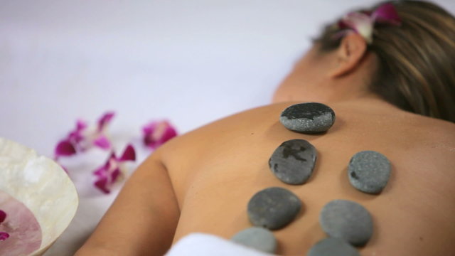 Hot stone spa treatment, closeup