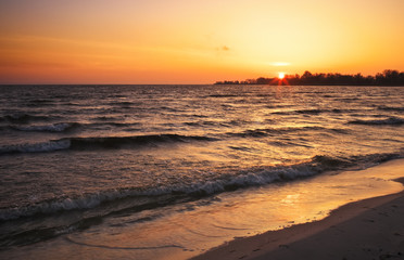 Beautiful landscape with sunset fiery sky. Composition of Nature