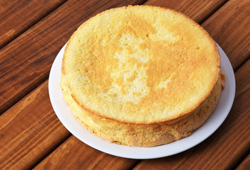 Round homemade biscuit cake made from flour, sugar powder, eggs