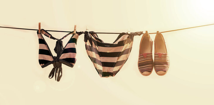 Vacation photo of swimsuit drying on the clothesline